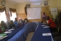 La délégation du PNE-B et l'équipe communale de Kouandé en salle
